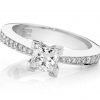 Princess tapering rounds engagement ring