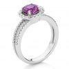 SAPPHIRE ORBIT – Diamond halo and pink sapphire ring