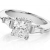 Radiant cut & tapered baguette three stone white gold engagement ring