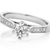 Vintage style solitaire diamond engagement ring with a round brilliant cut diamond set in a six split claw setting