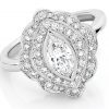 engagement ring of marquise cut diamond with a double row of grain set diamonds enhanced by millegraine detailing