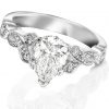 white gold pear cut shaped diamond ring with vintage vine band bead set with diamonds