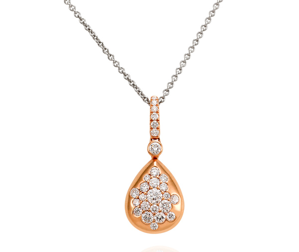 rose gold droplet shaped pendant speckled with assorted round brilliant diamonds on a white gold trace chain necklace