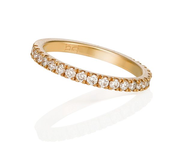 yellow gold wedding band with 3/4 circle of micro claw diamonds