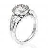 white gold Art Deco style diamond dress ring with a bezel set round brilliant cut diamond